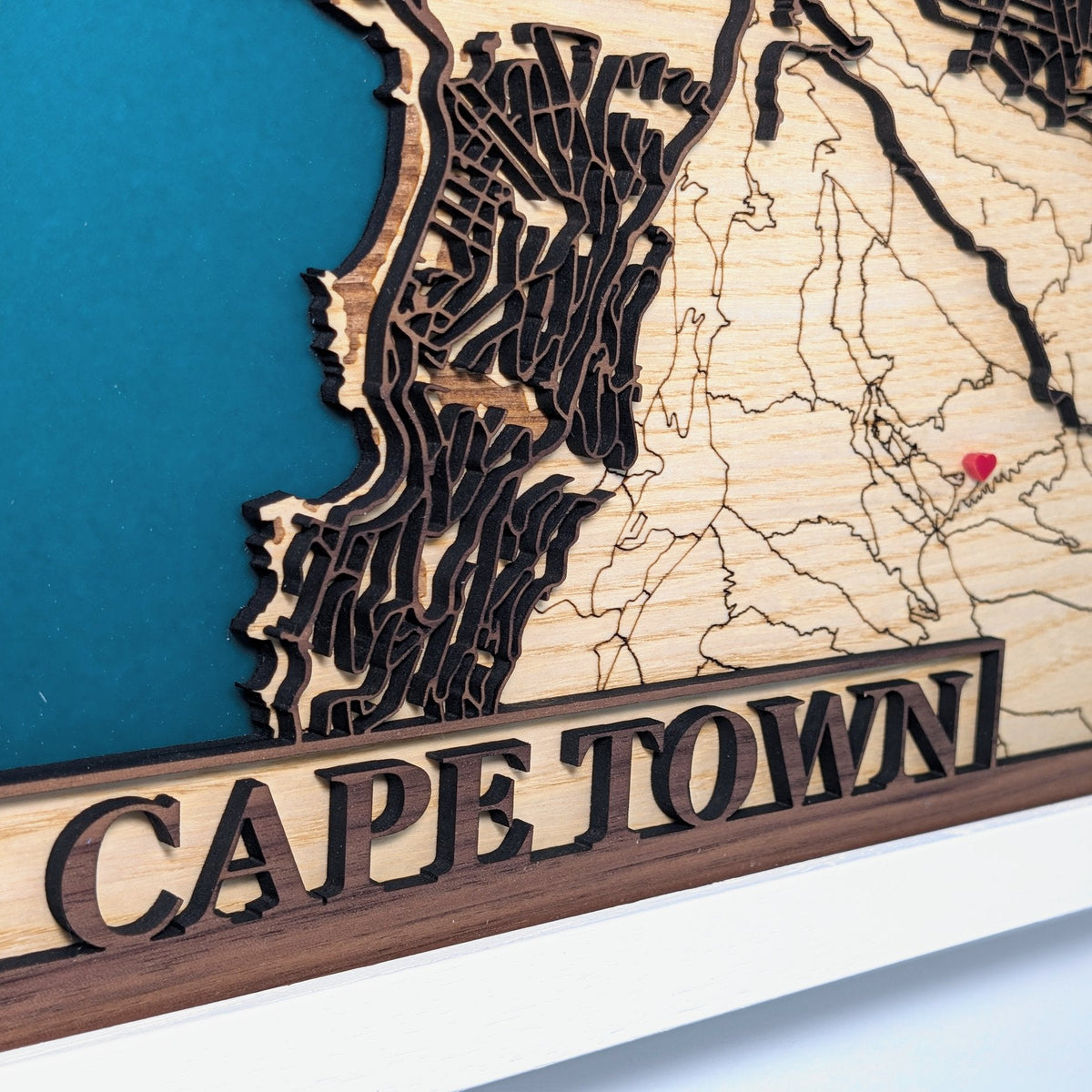 wooden map of cape town with red heart